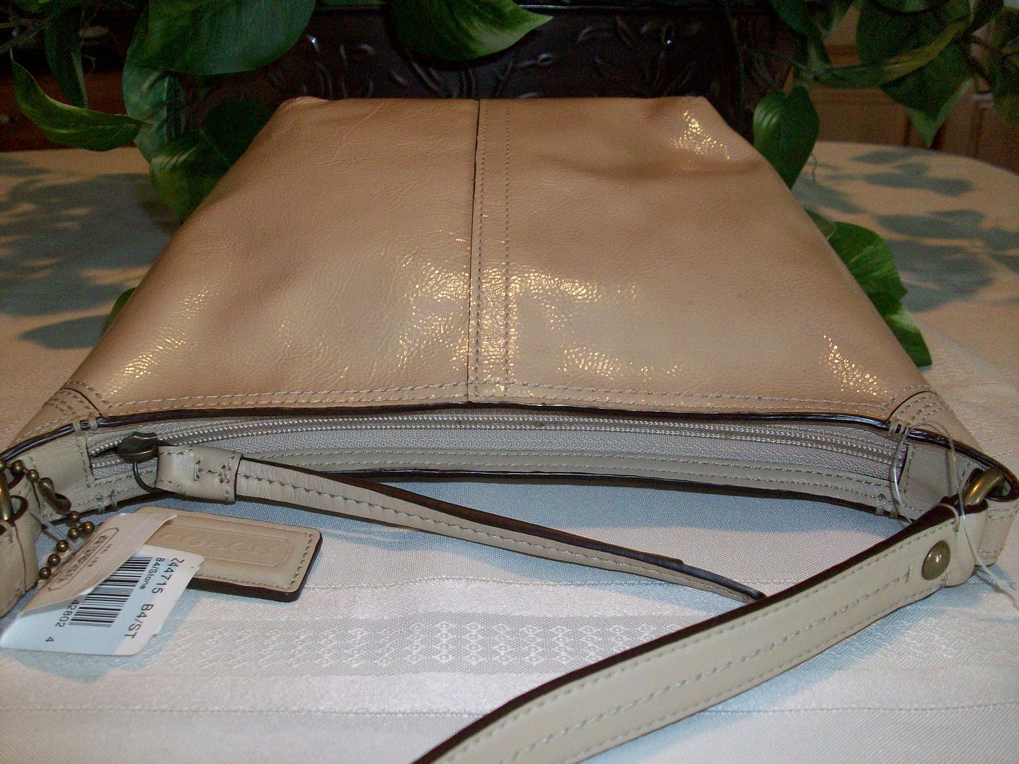 44715 bleecker patent leather top handle pouch stone top