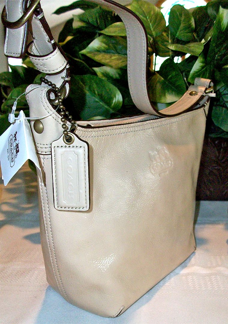 44715 bleecker patent leather top handle pouch stone side