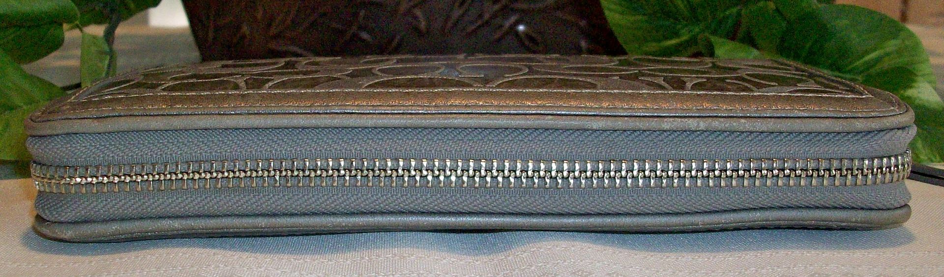 42842 metallic leather embossed zip around wallet gunmetal top