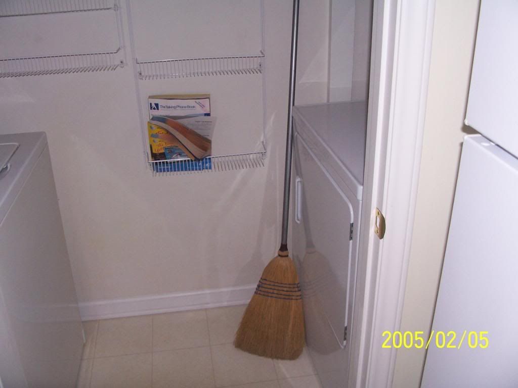 100_1979.jpg broom in washroom image by msquaredcleaning